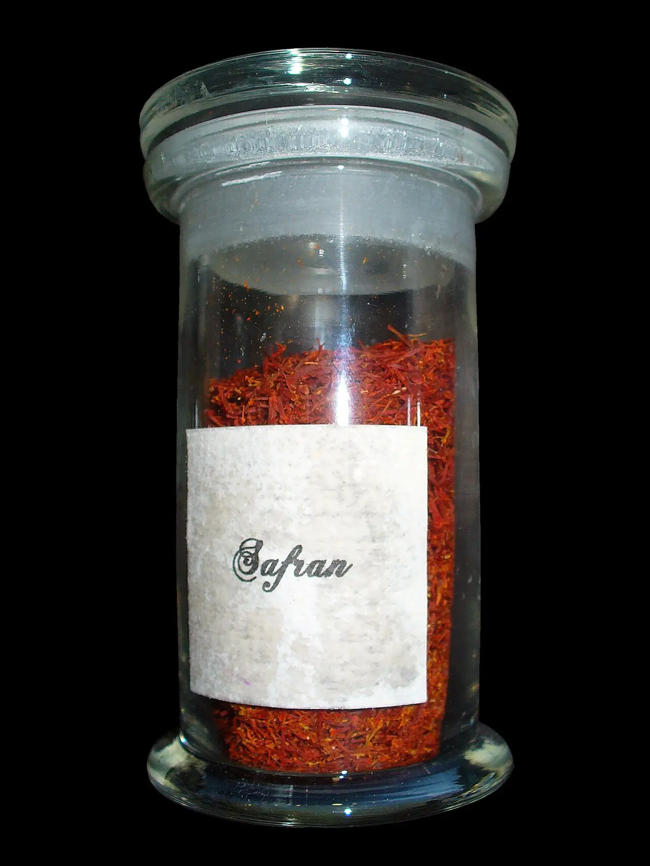 Crocus sativus flower in bloom, showing the red stigmas used as saffron